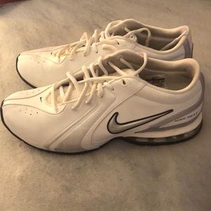 White and silver Nike Reax shoes